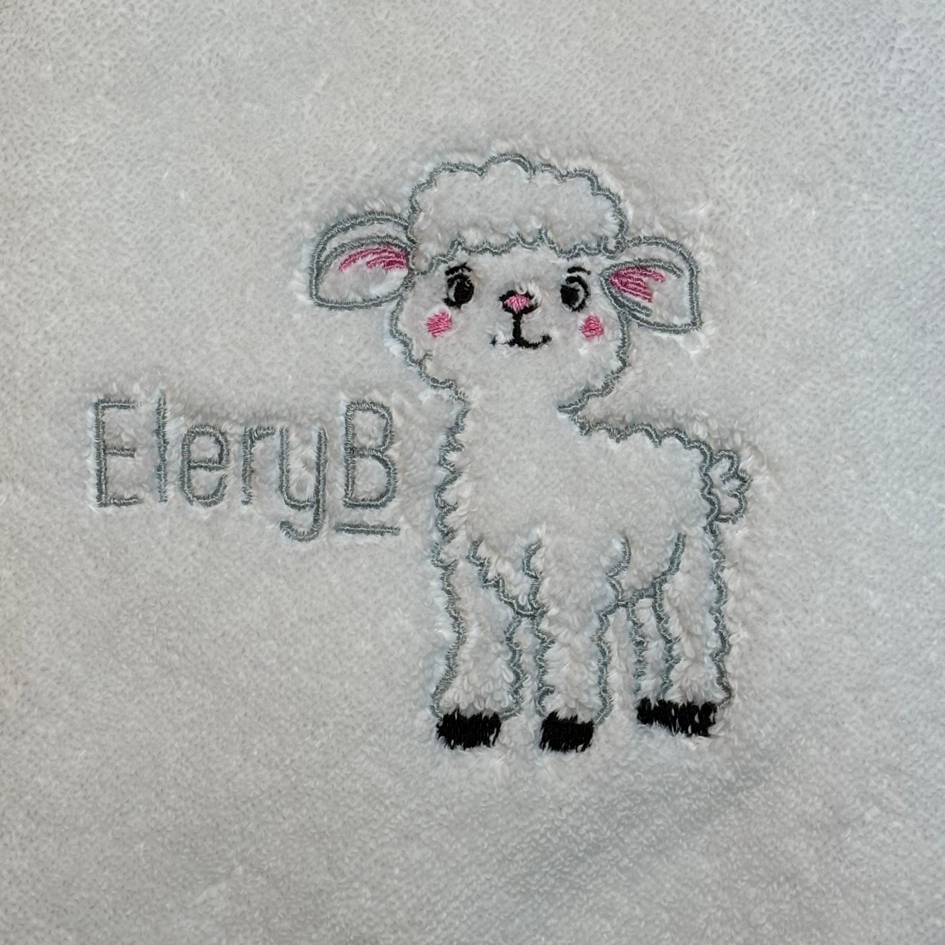 EleryB logo and signature embroidered lamb on soft white fabric
