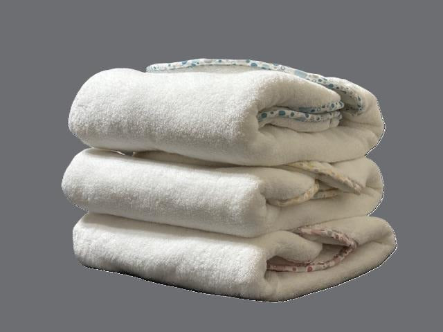 EleryB luxury towels in pink, blue, yellow, stacked
