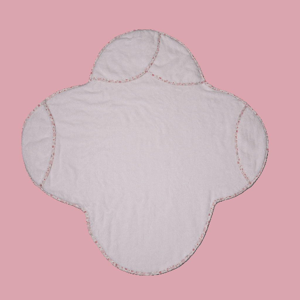 White EleryB hooded towel with pink geometric trim showing head and side flaps
