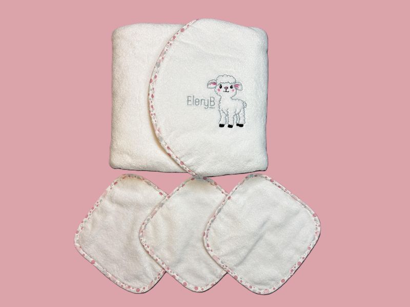 EleryB hooded towel and washcloth bundle with pink trim and lamb logo
