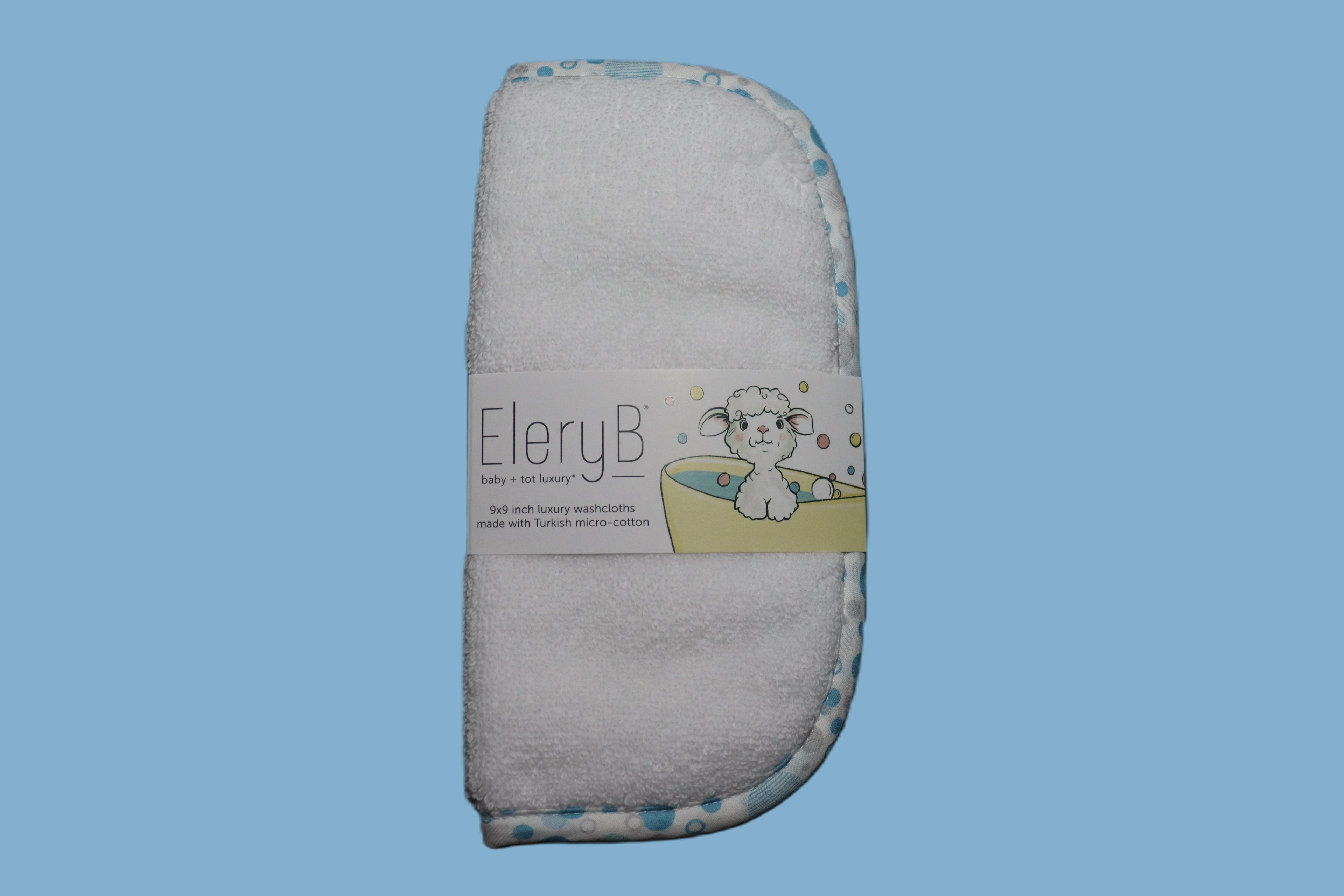 Three EleryB hypoallergenic washcloths with blue trim bundled in logo bellyband
