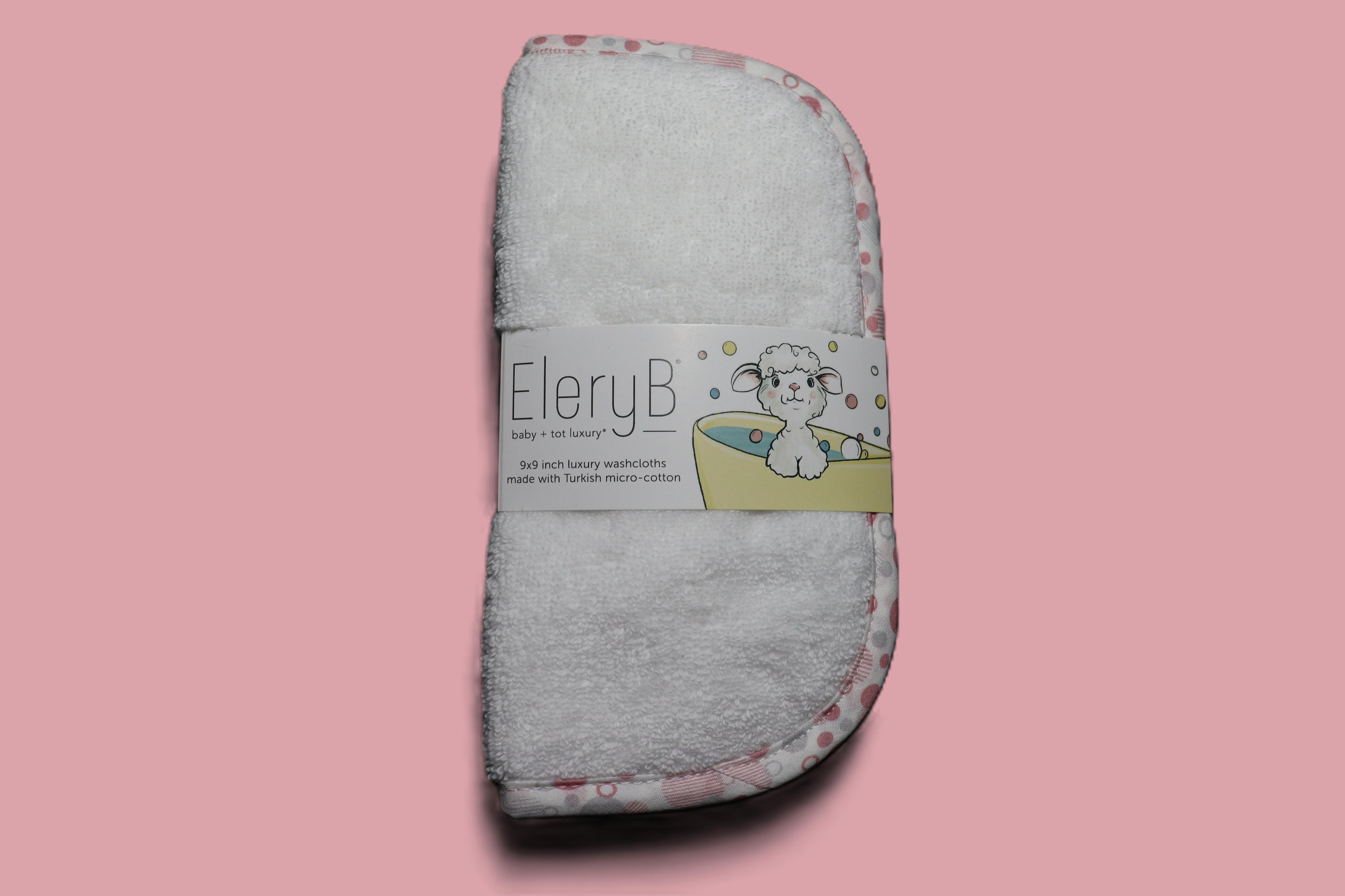 Three EleryB hypoallergenic washcloths with pink trim bundled in logo bellyband
